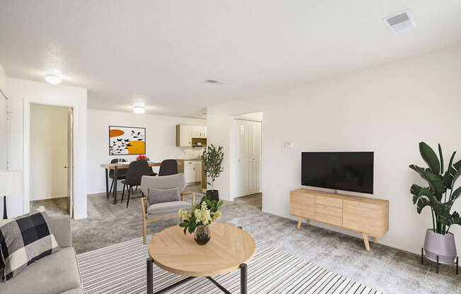 a living room and dining room at Seville Apartments, Kalamazoo, MI, 49009