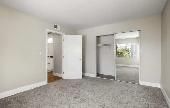 Sherman Oaks Apartments for Rent - Brody Terrace - Bedroom with Plush Carpeting and Mirrored Closet Doors