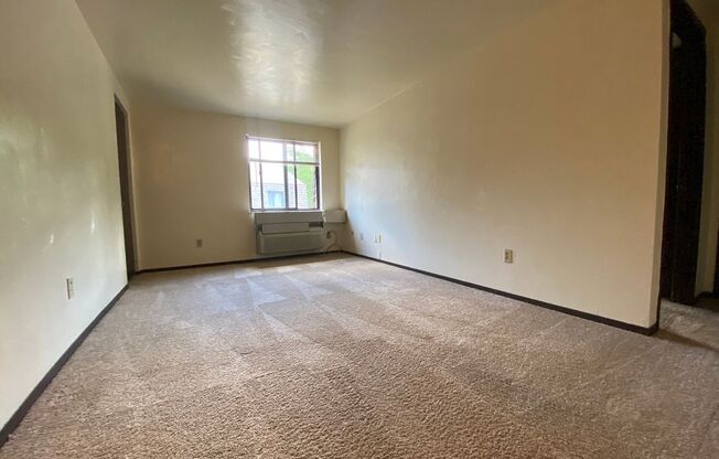 Amazing One Bedroom on the Second Floor! Built in A/C, Exposed Brick & More! Call Today!