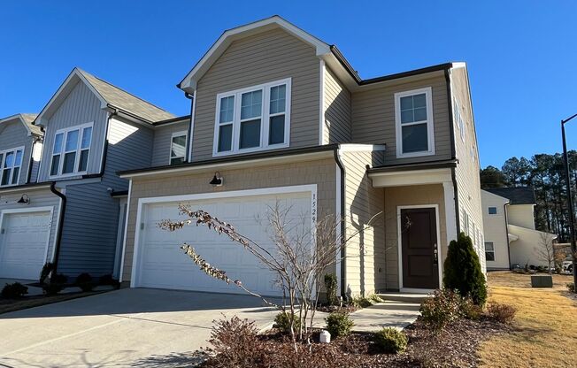 Newly Built 3BD, 2.5BA End Unit Durham Townhome with Attached 2-Car Garage in a Prime Location Near RDU Airport and RTP