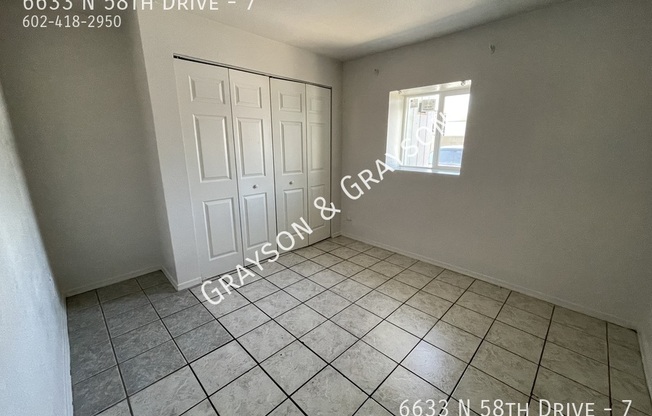 6633 N 58 DR