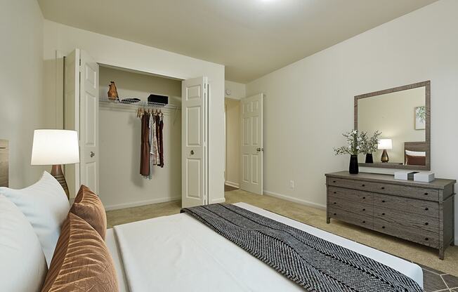 Bedroom With Closet at Grand Bend Club Apartments, Grand Blanc, MI