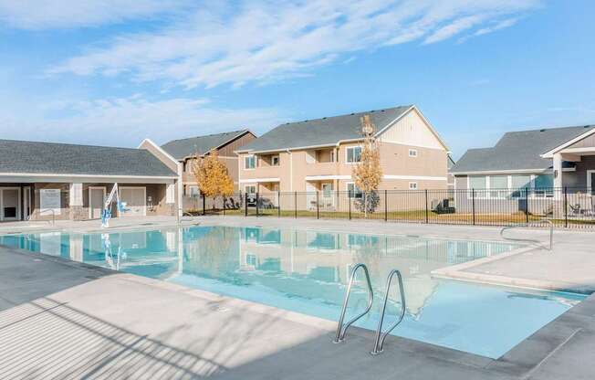 the preserve at ballantyne commons pool with apartment buildings in the background