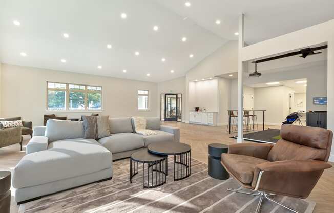 a living room with couches and a table at Copper and Quarry Village, Pikesville, MD
