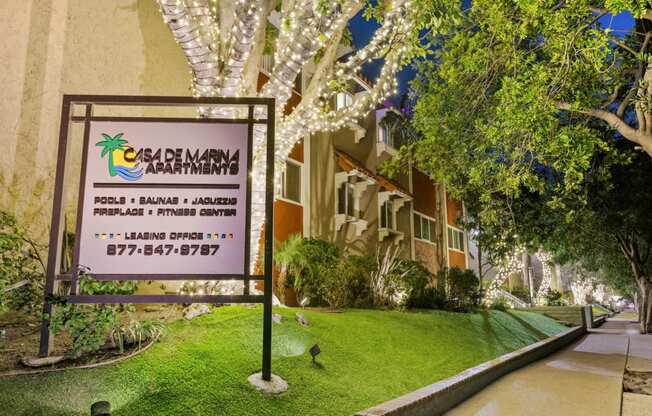 Apartments in Marina Del Rey, CA - Casa De Maria - Exterior Building View with Monument Sign, Tree Lights, and