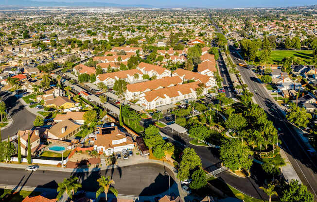 A suburban neighborhood with houses and streets.