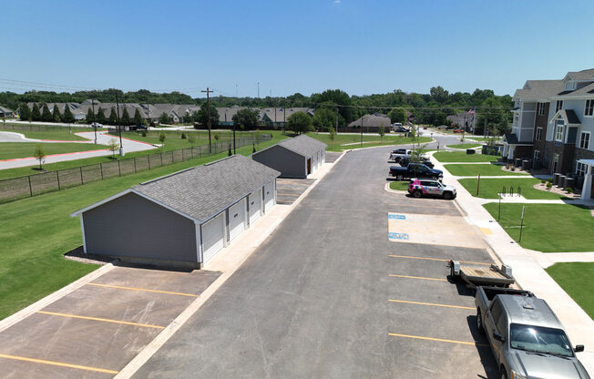 Aerial View of Parking Lot with Garages at Dodson Pointe Apartment Homes, Rogers, AR