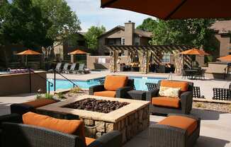 Gas Fire Pit With Outdoor Seating Near Pool