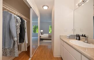 7.-Staged-Bathroom-and-Closet-to-Bedroom.jpg