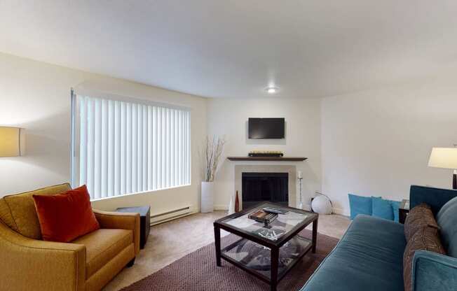 Living room with firepit at North Creek Apartments, Washington, 98208