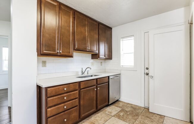 Spacious 4 Bed, 2 Bath Pet-Friendly Home with Central Air & Garage! - Available NOW!