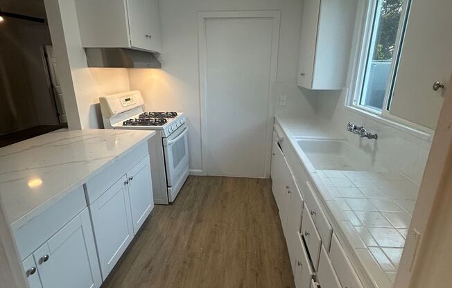 Remodeled Duplex with Quartz Kitchen Counter Tops