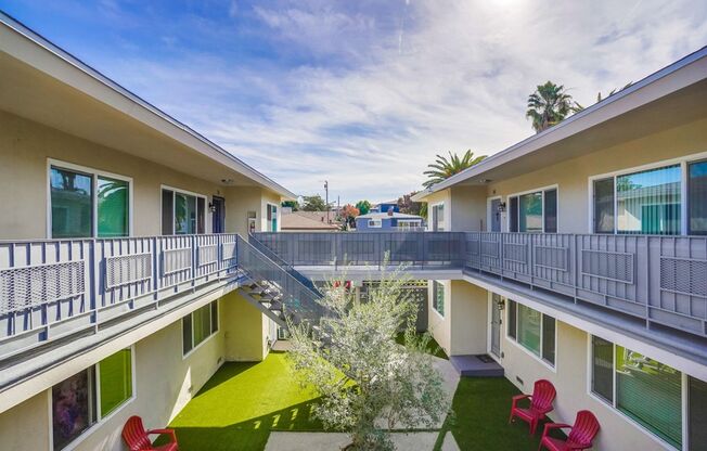 Retro Style Apartment Building with Pool and Gym - Secure, Modern and Lease-Ready!