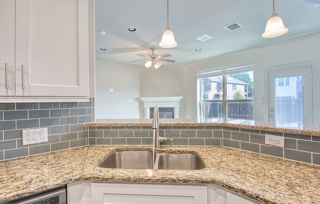 Luxury Sun-Drenched End-Unit Townhouse Offering Effortless Upscale Living in the Heart of Plano!