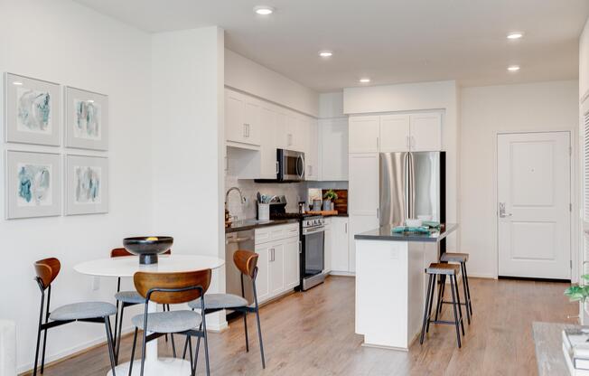 a kitchen with a dining room table