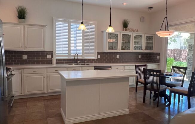 Live in Comfort and Style in the Prestigious Ocotillo Community!