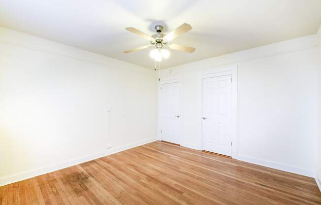 Wakefield-Hall-Bedroom-Closed-Closet-Doors-and-Ceiling-Fan