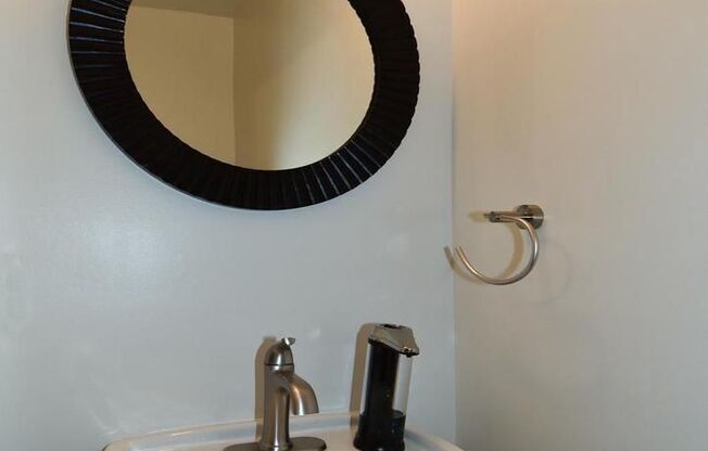 Beautifully updated townhome with an attached one-car garage.
