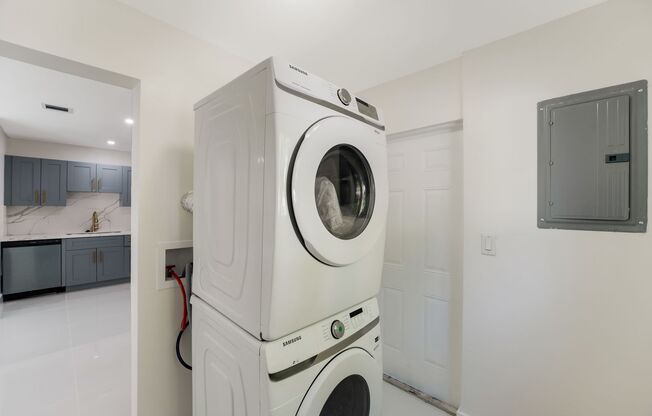 Fully renovated stylish 3 bed 2 bath home featuring a luxury kitchen, modern appliances on a fenced lot with parking!