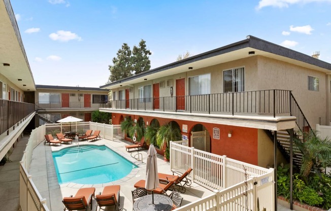 Luxury Apartments in Sherman Oaks for Rent - Parkview Terrace Apartments - Swimming Pool with Lounge Chairs and Shaded Table Seating