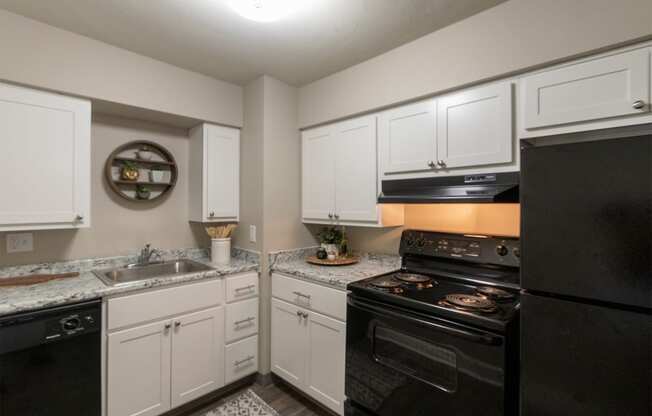 This is picture of the kitchen in the 823 square foot 2 bedroom apartment at Aspen Village Apartments in the Westwood neighborhood of Cincinnati, OH.