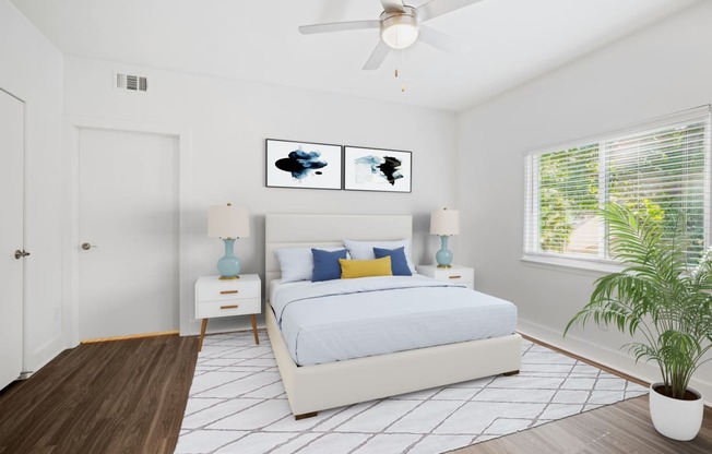 A white bedroom with a full sized bed and mattress