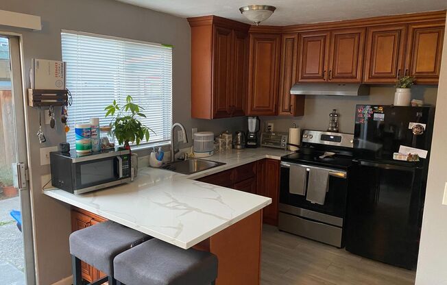 Remodeled 2 bedroom beautiful LVT flooring, updated kitchen and bathroom, reserved parking