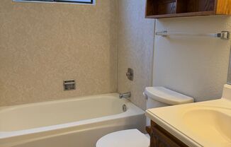 CUTE 2 BEDROOM HALF-PLEX WITH PRIVATE YARD!