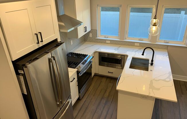 Incredible 4-Bedroom Townhouse in the Heart of Brewerytown! One-Car Garage Included!