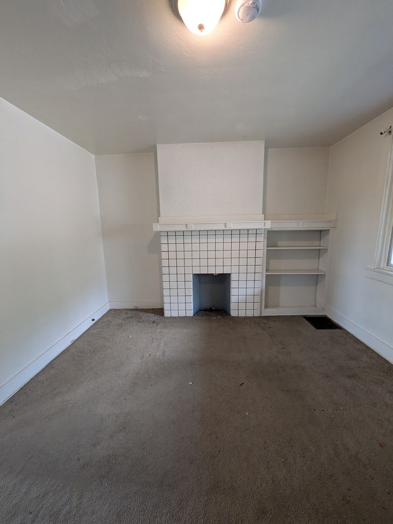 2 bed 1 bath home with large living room and yard!
