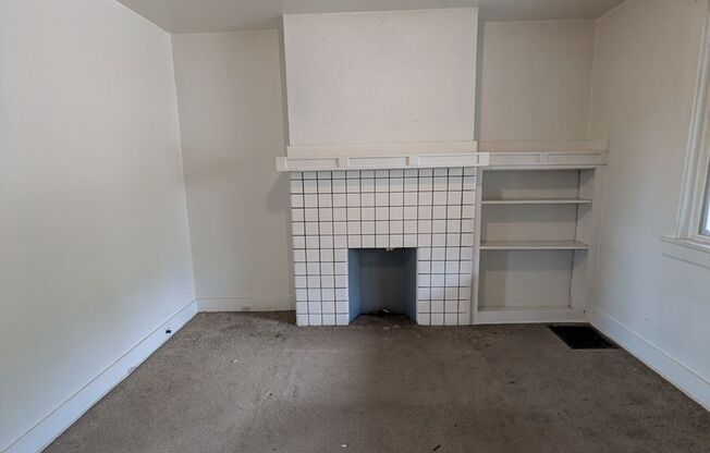 2 bed 1 bath home with large living room and yard!