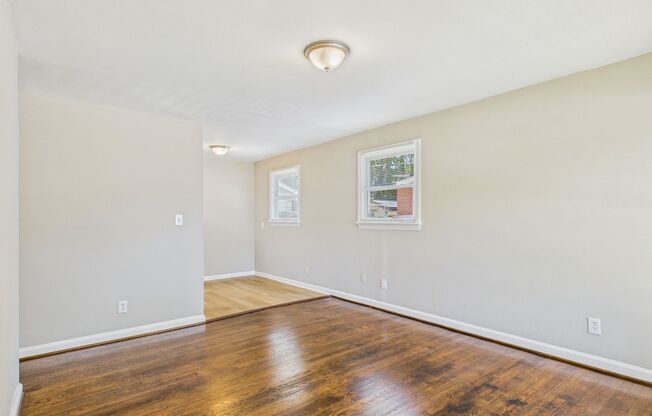 Updated home with New Kitchen, Hardwood Floors, Fenced!