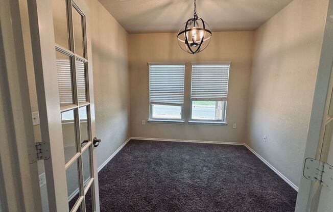 Open design in Northeast Crossing on large CORNER LOT! 3 bedrooms + study/2.5 baths/game room/2-car garage