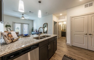 Lenox SoCo Apartments kitchen with a stainless steel appliances