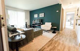 Tacoma Apartments - Aero Apartments - Living Room, Hallway, and Bedroom