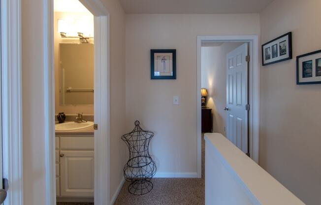 This is a photo of the second floor hallway in the 1242 square foot, 2 bedroom, 2 and 1/2 bath Spinnaker floor plan at Nantucket Apartments in Loveland, OH.