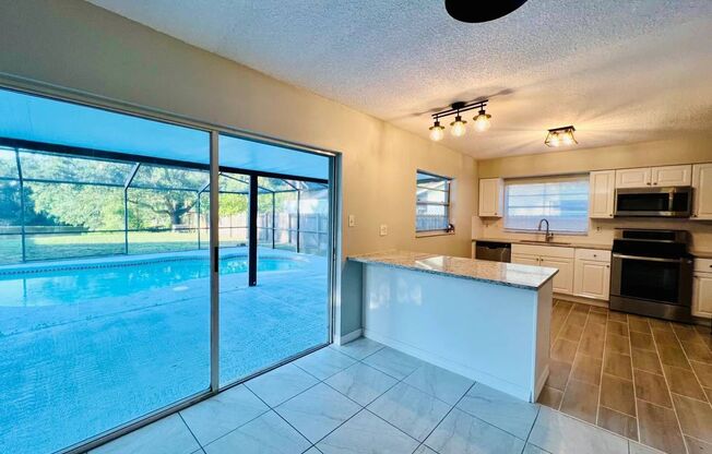 Renovated Water View and POOL home at central Brandon!