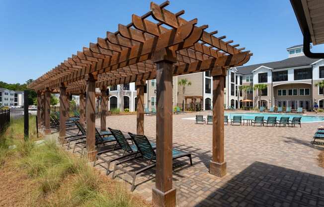 Swimming Pool With Relaxing Sundecks at Abberly Crossing Apartment Homes by HHHunt, South Carolina