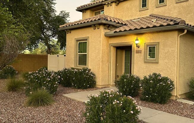 Charming 3 Bed + Den 2.5 Bath Home with 2 car attached EV garage with community pool !!