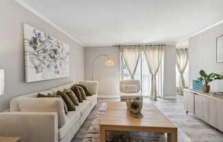 a living room with a couch and a coffee table