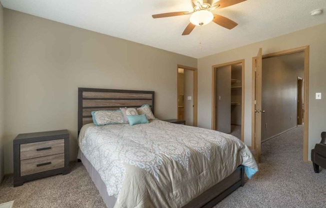 Master bedroom with walk-in closet and master bath at Southwind Villas in southwest Omaha in La Vista, NE, 68128