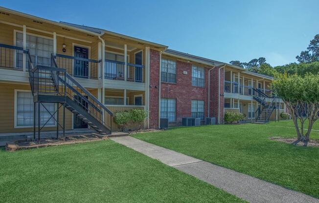 a large lawn in front of a building