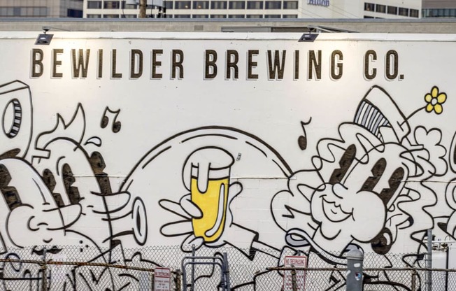 a mural on the side of a beer truck