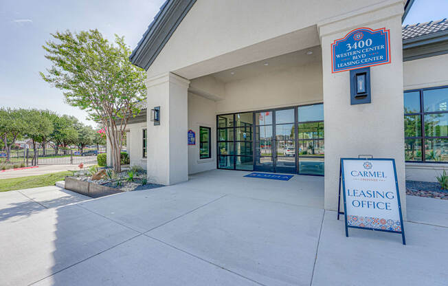 a leasing office with a sign that says carroll leasing office