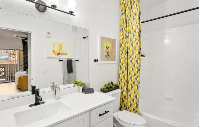 San Portella, Tempe, AZ, Bathroom A bathroom with a white sink and a yellow curtain.
