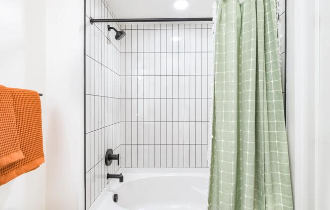 Clean lines, modern tile, and sleek finishes make every bathroom feel like a fresh start to your day.