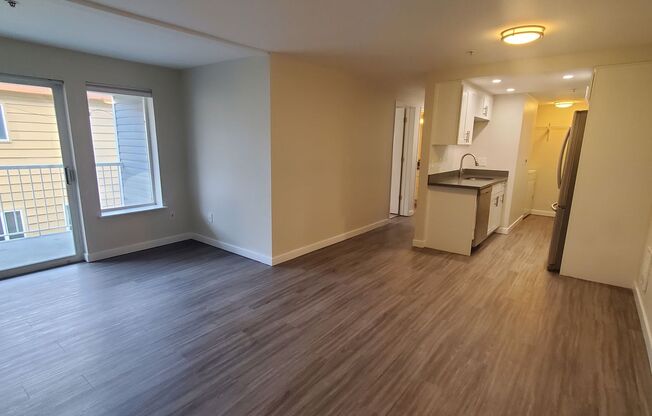 TWO WEEKS FREE! Sleek and Spacious 2x2 with Gated Parking and In-Unit Laundry