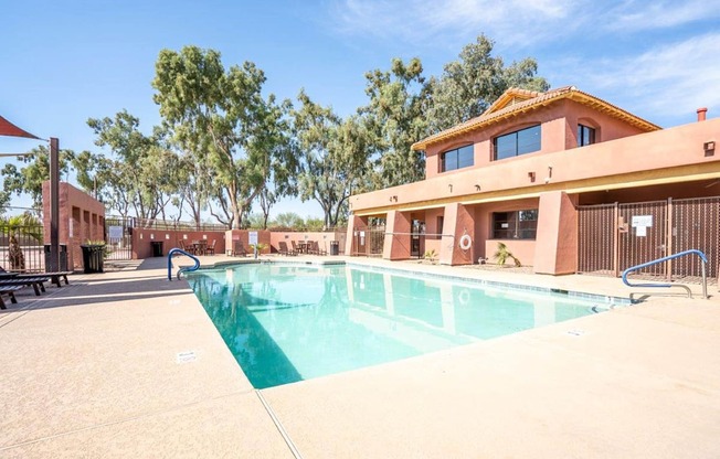The pool is connected to the clubhouse at Village Greens of Queen Creek