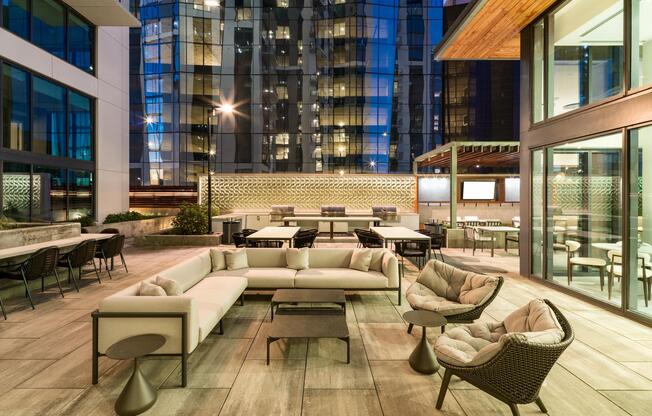An inviting outdoor terrace at Modera McGavock, offering refined seating and city views just a short drive from the energy of downtown Nashville.