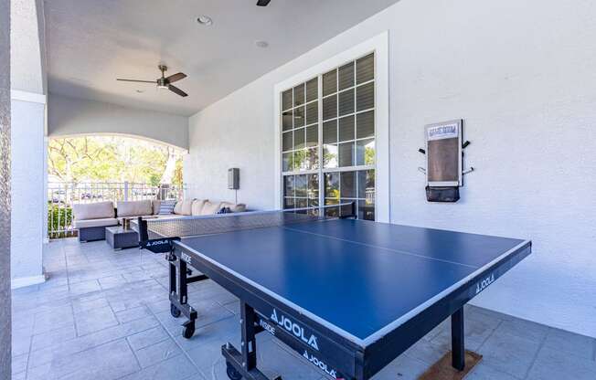 play a game of ping pong in the covered patio